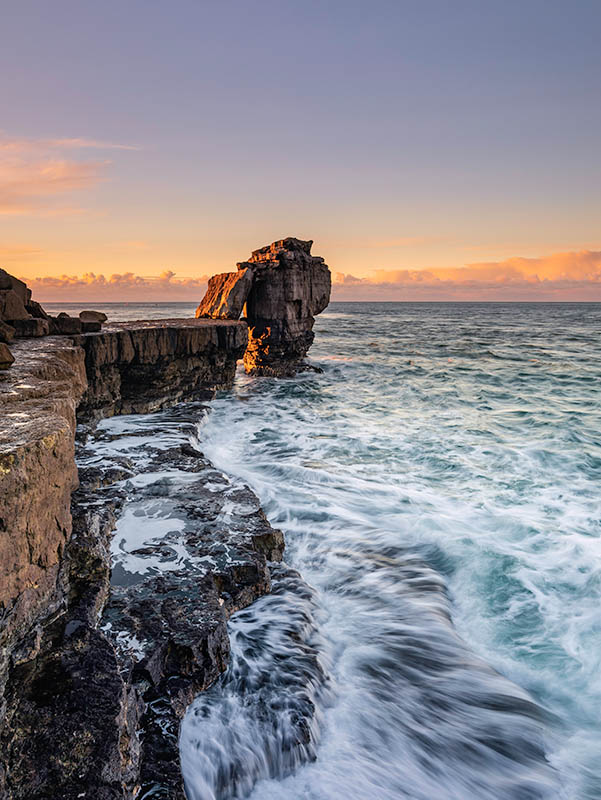 Pulpit Rock at Portland Bill at sunrise, Dorset, Jurassic Coast, England.