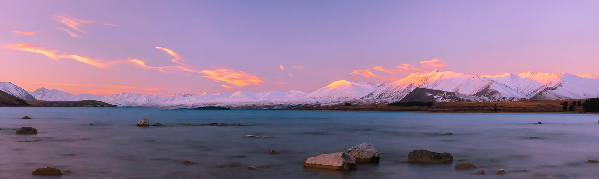 Panoramic photo of Lake Tekao at Sunset, South Island, New Zealand.