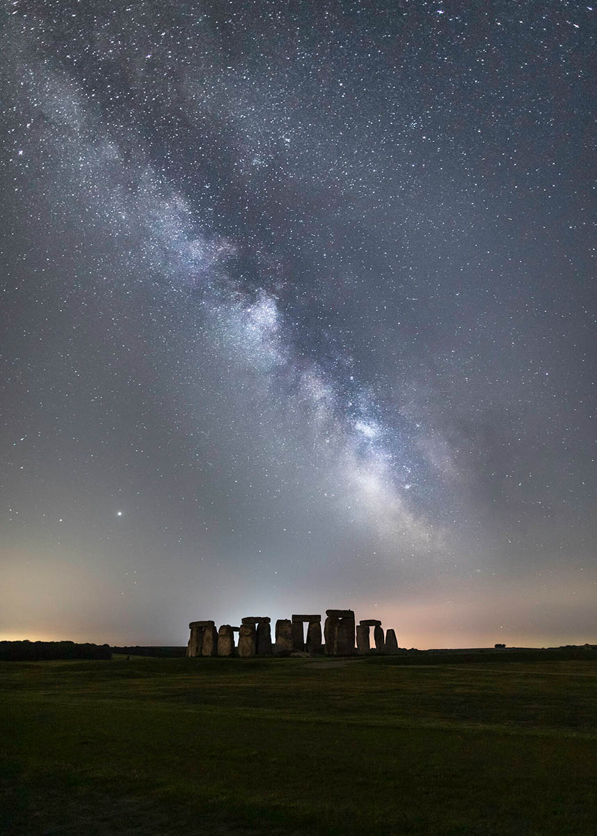 Milky Way over Stonehenge, Wiltshire, England. Buy a fine art print.