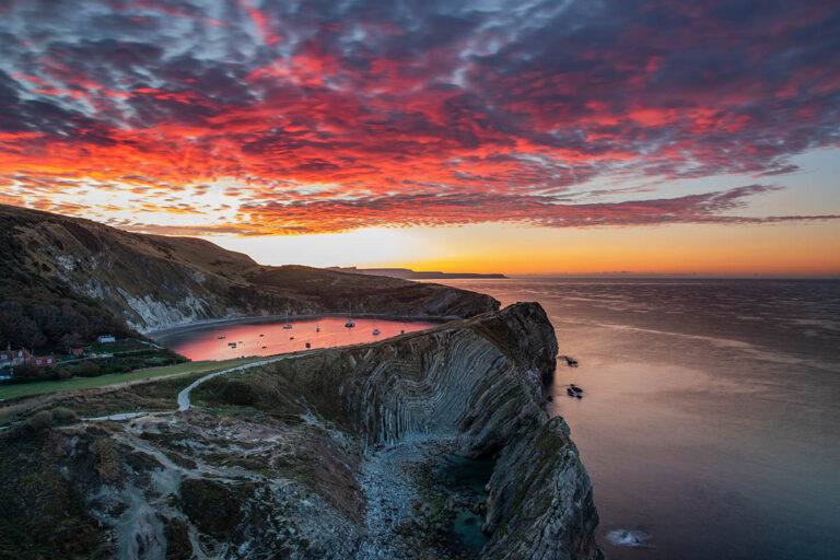 Stair Hole at sunrise, a small cove located just west of Lulworth Cove in Dorset, England.
