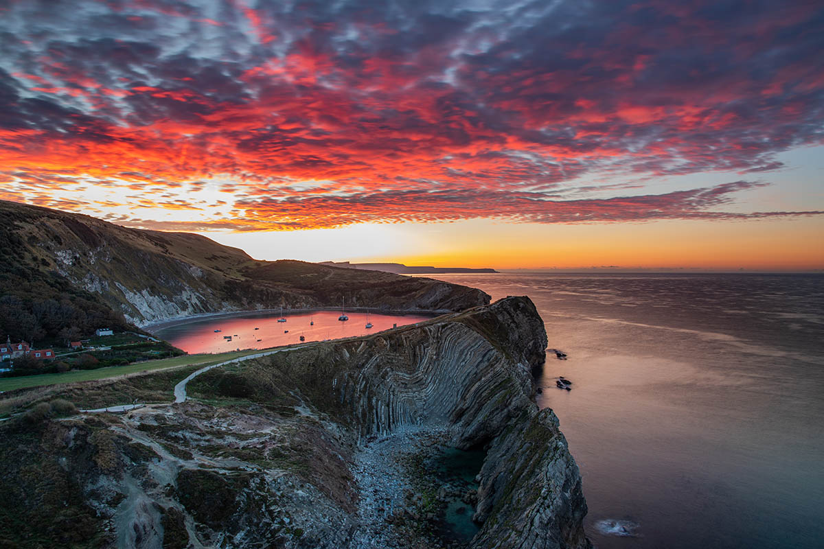 Stair Hole at sunrise, a small cove located just west of Lulworth Cove in Dorset, England.